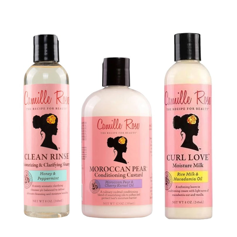 Three bottles of Camille Rose hair care products on a white background