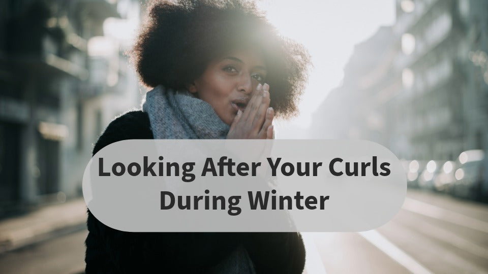 Woman with curly hair in winter weather