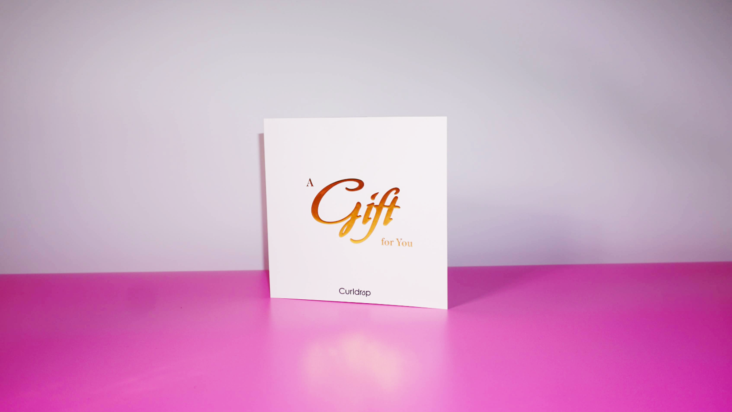 White card with gold text &