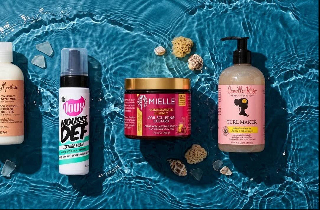 Hair care products arranged on blue water  backgroundwith small props.